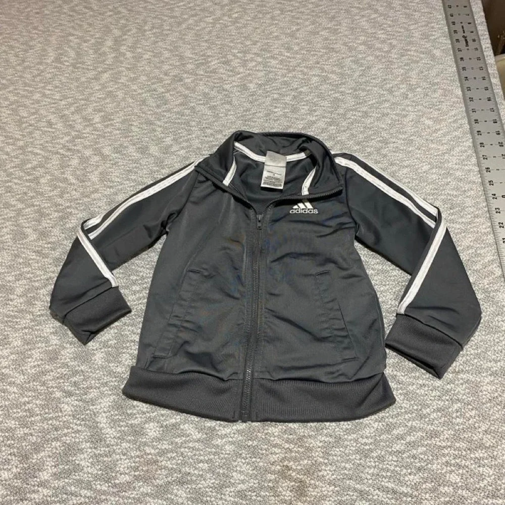 Adidas black & gray jacket with white stripes on sleeves kids size 4. SKU-B191